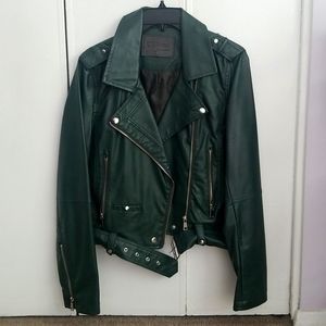 Dark green faux leather jacket with silver details. Size Medium.